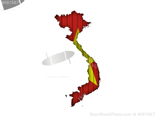 Image of Map and flag of Vietnam on corrugated iron