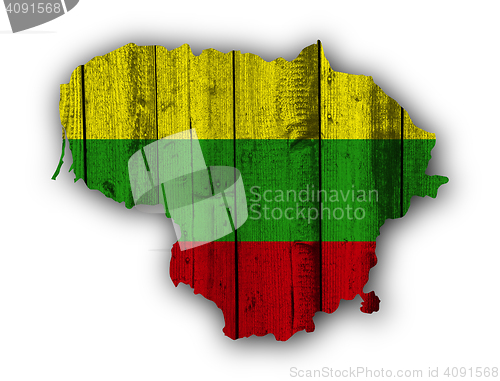 Image of Map and flag of Lithuania on weathered wood