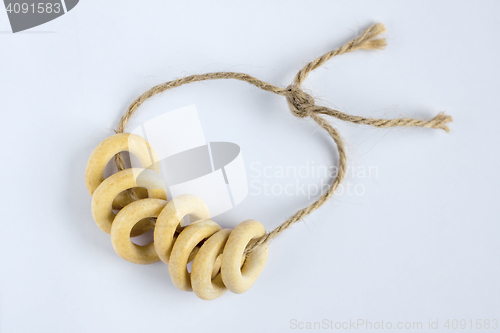 Image of Small ring-shaped crackers on rope