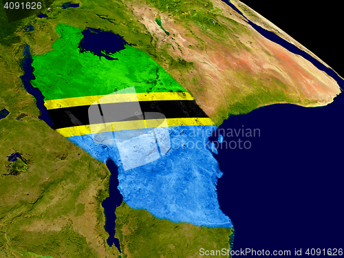 Image of Tanzania with flag on Earth