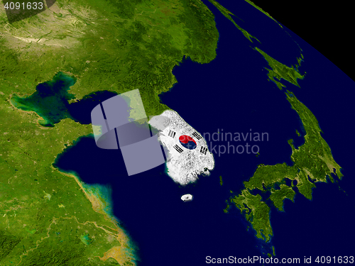 Image of South Korea with flag on Earth