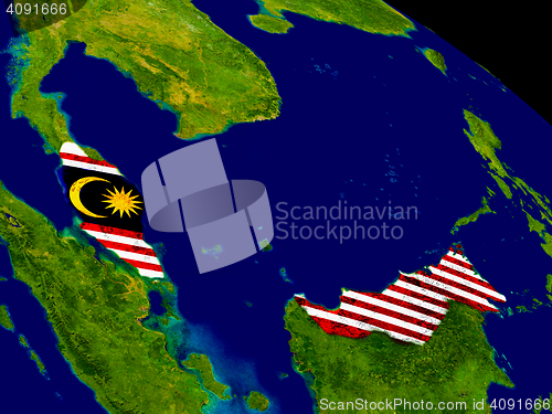 Image of Malaysia with flag on Earth