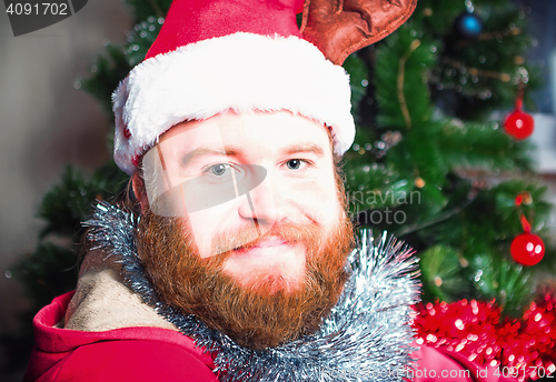 Image of Bearded Man In A Red Suit Of Santa Claus 