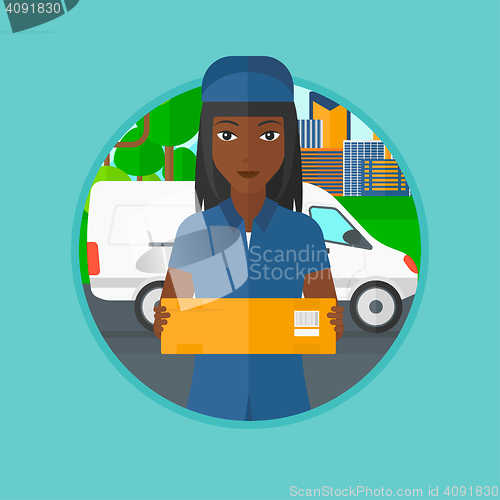 Image of Delivery woman carrying cardboard boxes.