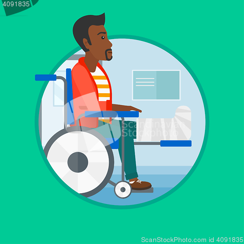 Image of Man with broken leg sitting in wheelchair.