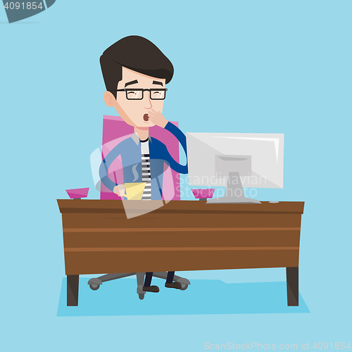 Image of Tired employee working in office.