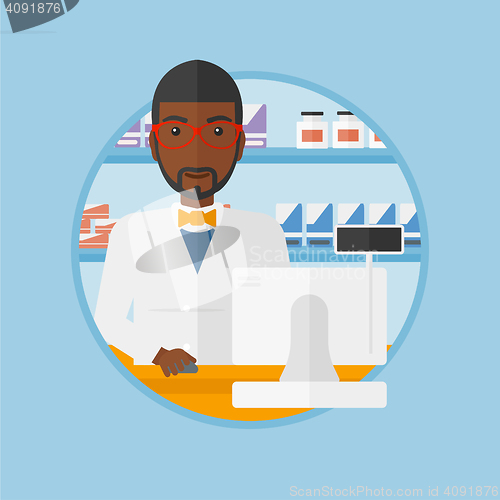 Image of Pharmacist at counter with cash box.