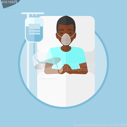 Image of Patient lying in hospital bed with oxygen mask.