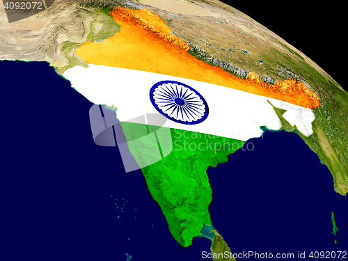 Image of India with flag on Earth