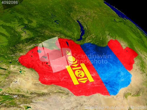 Image of Mongolia with flag on Earth