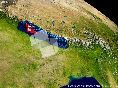 Image of Nepal with flag on Earth