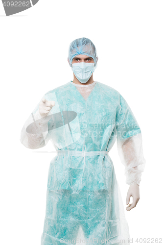 Image of Surgeon portrait. points finger. isolated on white background