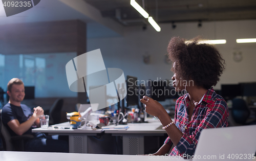 Image of portrait of a young successful African-American woman in modern 