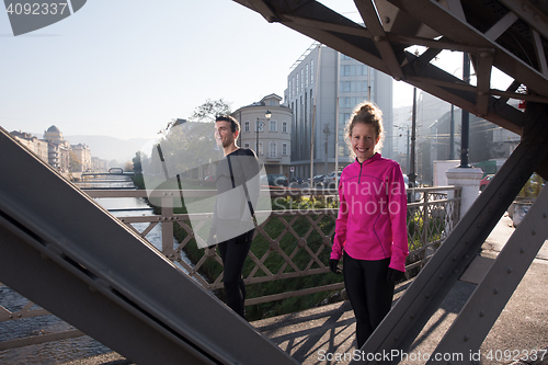 Image of young  couple jogging