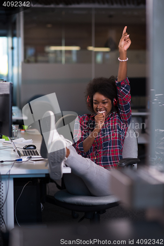 Image of portrait of a young successful African-American woman in modern 