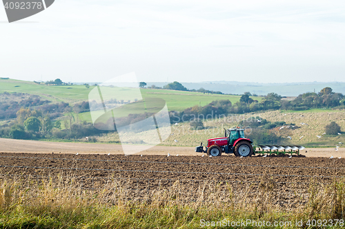 Image of Tractor Ploughing Field