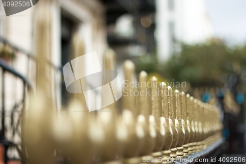 Image of Gilded Railings in City Street