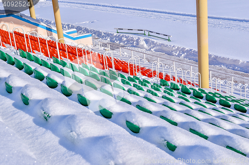 Image of Background chairs at stadium , winter