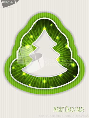 Image of Green christmas greeting with bursting christmas tree
