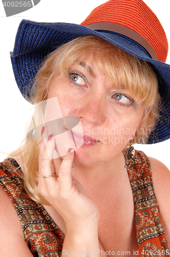Image of Blond woman with hat.