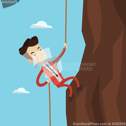 Image of Businessman climbing on the mountain.