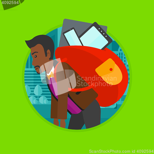 Image of Man with backpack full of electronic devices.