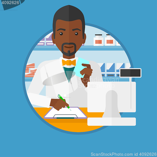 Image of Pharmacist writing prescription.