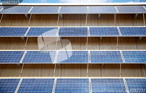 Image of solar battery panels on building facade