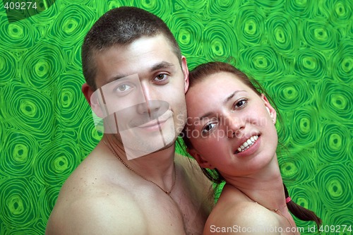 Image of  Portrait of the young beautiful couple at home