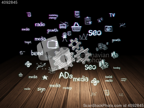 Image of Advertising concept: Gears in grunge dark room