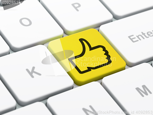 Image of Social network concept: Thumb Up on computer keyboard background