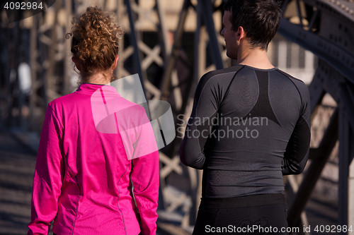 Image of young  couple jogging