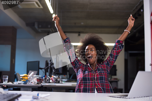 Image of portrait of a young successful African-American woman in modern 