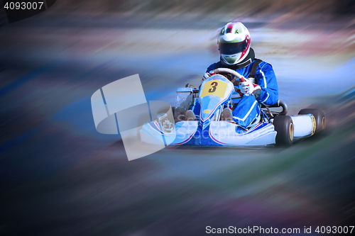 Image of Karting - driver in helmet on kart circuit