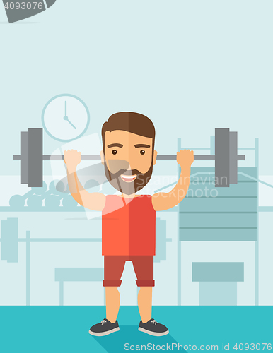 Image of Handsome man lifting a barbell
