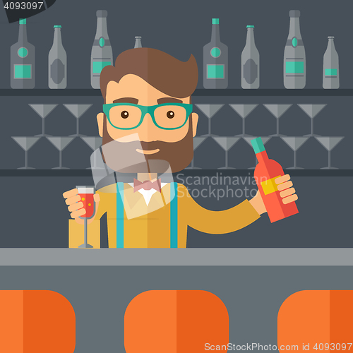 Image of Bartender at the bar holding a drinks.