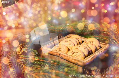 Image of natural green fir christmas wreath and oat cookies