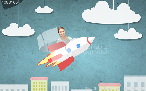 Image of teen girl flying on rocket above cartoon city