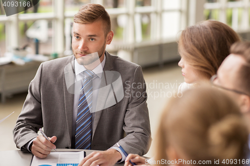 Image of business people meeting at office