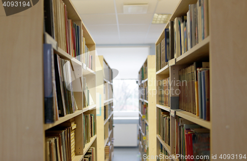 Image of bookshelves with books at school library