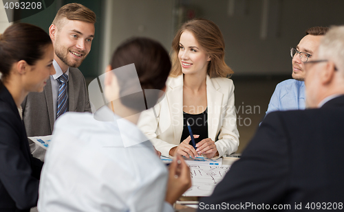 Image of business team with scheme meeting at office