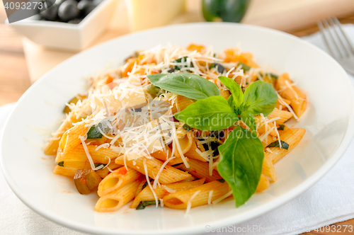 Image of pasta whith vegetables on the plate