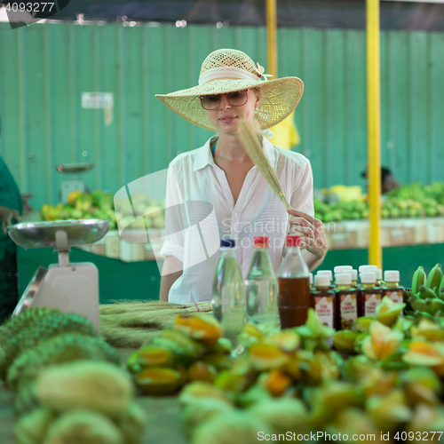 Image of Traveler shopping on traditional Victoria food market, Seychelles.