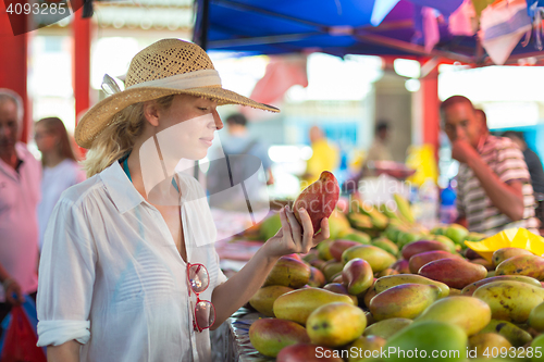 Image of Traveler shopping on traditional Victoria food market, Seychelles.