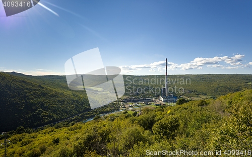 Image of Large valley with power plant