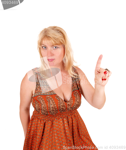 Image of Blond woman pointing finger.