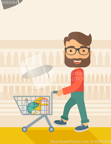 Image of Male Shopper Pushing a Shopping Cart.