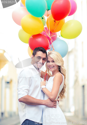 Image of couple with colorful balloons