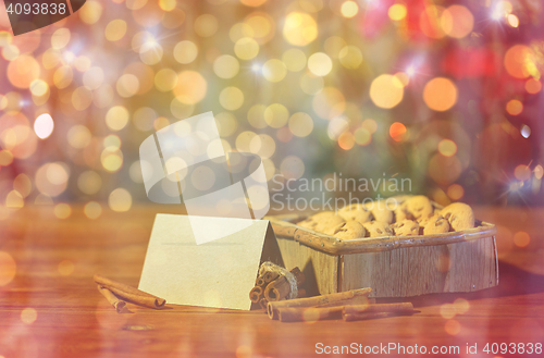 Image of close up of christmas oat cookies on wooden table