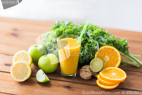 Image of glass of orange juice, fruits and vegetables